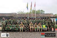 The team a group photograpgh after graduating