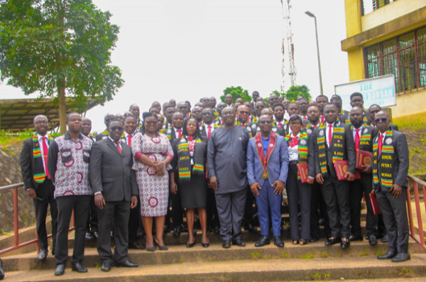 A group picture of the inducted 75 engineers and some dignitaries who attended the event