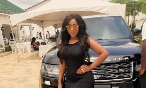 Benedicta Gafah poses with her Range Rover