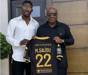 Black Stars defender Mohammed Salisu (L) and President John Dramani Mahama (R)