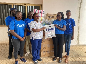 Staff of Flora Tissue making the donation