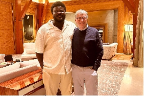 A visibly-happy Darlington Akogo with Bill Gates