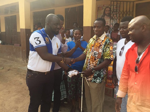 Officials of GH Sporting Club hand over the items