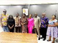 Dzifa Gomashie (M) with the members of the delegation when they visited her