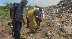 Police personnel at the crime scene