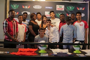CEO of Astro Football Academy with the coach and some players