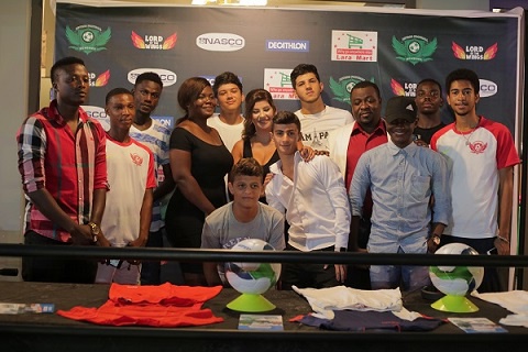 CEO of Astro Football Academy with the coach and some players