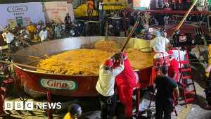 Hilda Baci and her team cooking the largest ever pot of jollof rice