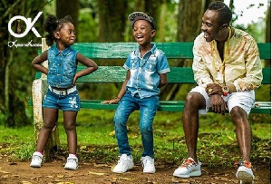 Okyeame Kwame with kids