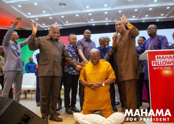 John Mahama receiving prayers from clergymen