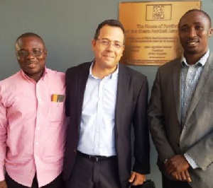 Kotoko official Thomas Boakye-Agyemang and CS Sfaxien official.
