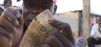 Dealers buy the tattered notes and make profits off the black market