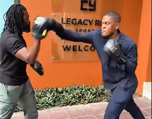 Sharaf Mahama (fair in complexion) is a boxing promoter