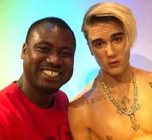 Abeiku Santana with wax of Justin Bieber