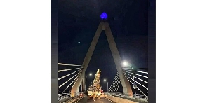 The Tanzanite Bridge at night after it was rebranded with the gemstone's symbol