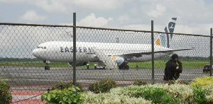 A plane carrying the deportees from the United States arrives at the Roberts International Airport A plane carrying the deportees from the United States arrives at the Roberts International Airport