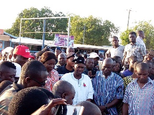 The Upper East Regional Minister, Paulina Tangoba Abayage mobbed by people of her region