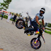 A biker displaying his skills at the Bike and Screech Festival