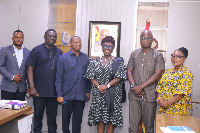 Dzifa Gomashie (3rd from R) with Dr Collins Rawlings Nunyoname and his team during their visit