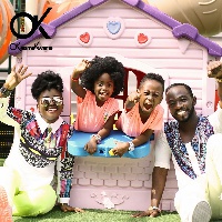 Okyeame Kwame with his wife and kids