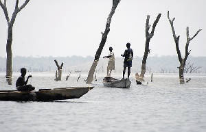 Children fishing on the Volta lake