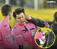 Referee Halil Umut Meler getting punched