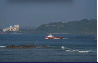 A vessel sails off Galle, Sri Lanka, after a US submarine attack on the Iranian military ship I