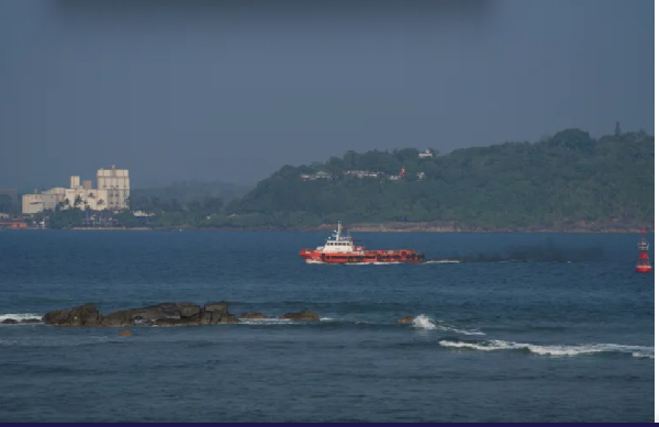 A vessel sails off Galle, Sri Lanka, after a US submarine attack on the Iranian military ship I