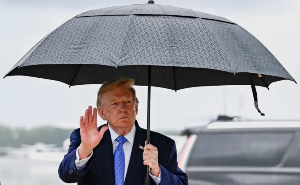 Trump waves after landing in Maryland
