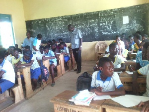 The New Juaben MCE Kwabena Kusi Okyere interacting with students