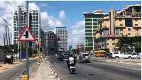 Motorists drive along Bagamoyo Road in Dar es Salaam, Tanzania.