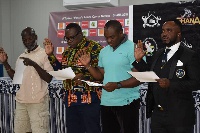 Mr Yartey (right) and the new executive taking the Oath of Office after the election
