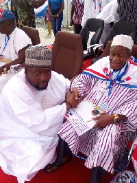 Abdul Aziz Haruna Futa with an elder of NASARA
