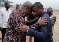 Faure Gnassingbe of Togo in a somber embrace with Preisdent Mahama