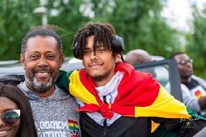 Franklin Peters and his son, Quincy when they arrived in London