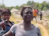 The woman grieving over her brother's container that had been destroyed