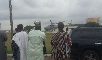 Some Muslim leaders watching the helicopter that airlifted the remains of madam Hajia Abiba Nnaba