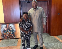 Wayoosi posing for a picture with President Mahama