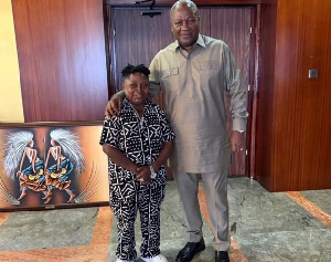 Wayoosi posing for a picture with President Mahama
