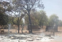 Scene from one of the torched settlement