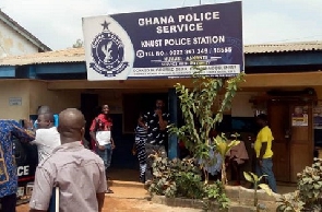 File photo: People at a police station