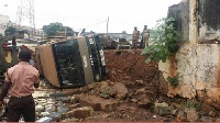A section of the Kumasi Prison wall destroyed by heavy downpour