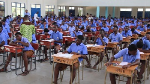 Some students of the Presbyterian Boys Senior High School (PRESEC) Legon writing their exams