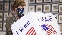 A woman casts her vote at the Hazel Parker Playground (GETTY IMAGES | AFP)