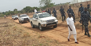 The Commissioner of Police, among other officers during a visit to the affected community