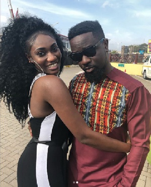 Sarkodie in an embrace with Wendy Shay