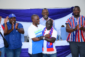 Former and current Fomena constituency chairmen hugging it out with NAPO looking on from behind