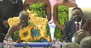 The Asantehene Otumfuo Osei Tutu II (R) with Dr Johnson Asiama of the BoG