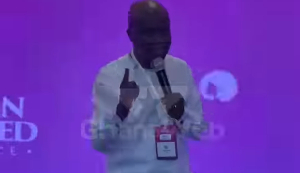 Rev. Anthony Dzadzra speaking at the 2025 Woman Redefined Conference