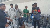 Ghanaian footballers arriving at the airport.